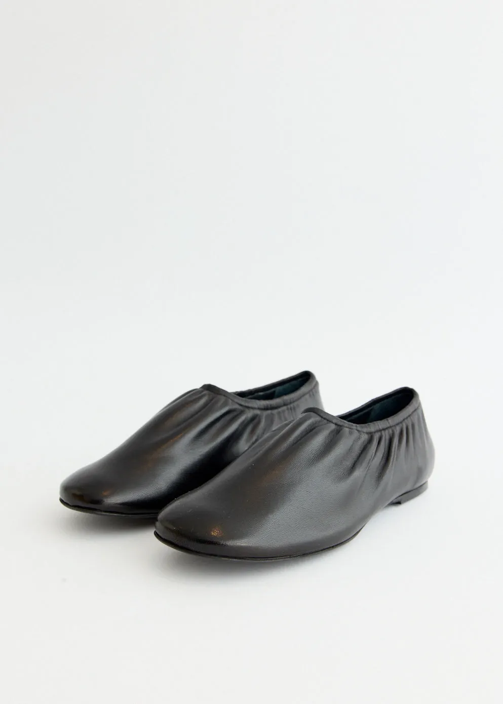 Swan Slip Ons