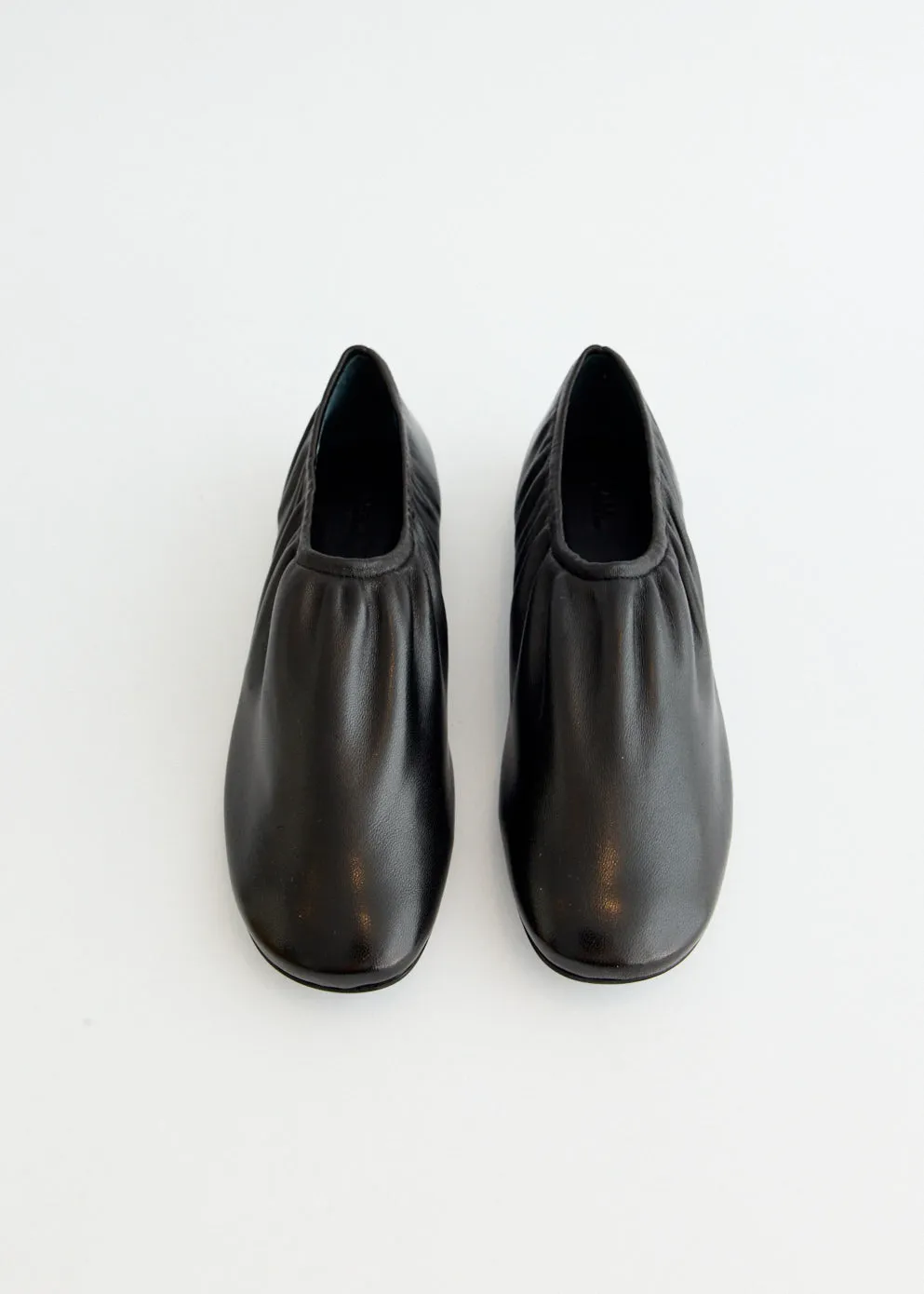 Swan Slip Ons